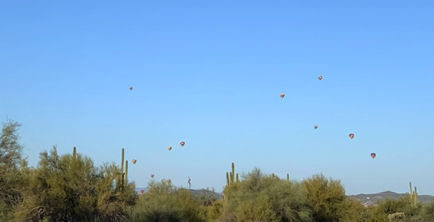 Mar 26 - We counted at least 17 balloons in the sky on Sunday morning while driving west on Carefree Hwy. Mar 26 - We counted at least 17 balloons in the sky on Sunday morning while driving west on Carefree Hwy.